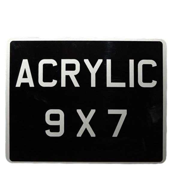 An acrylic motorcycle number plate with the text 'ACRYLIC 9X7' displayed prominently in white against a black background.