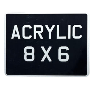 Black acrylic motorcycle number plate with white text stating 'ACRYLIC 8X6'.