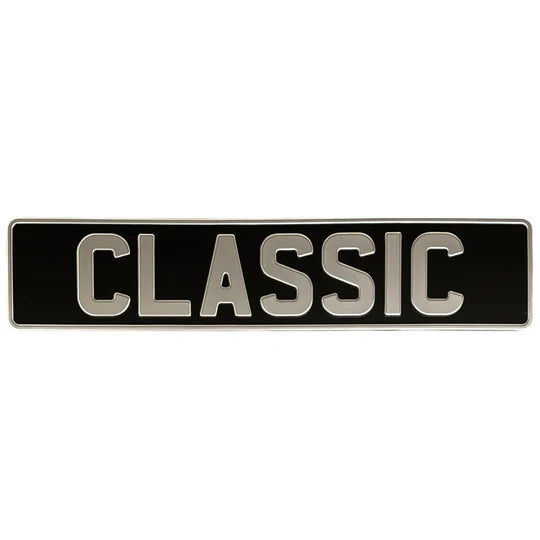 Black rectangular number plate with 'CLASSIC' in white letters on a white background