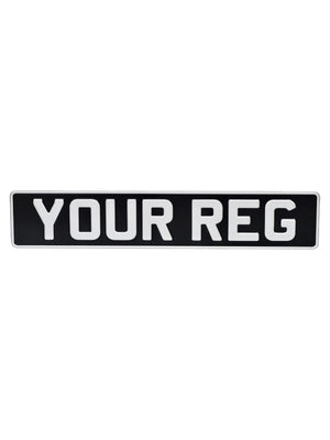 Classic black and white number plate with white border
